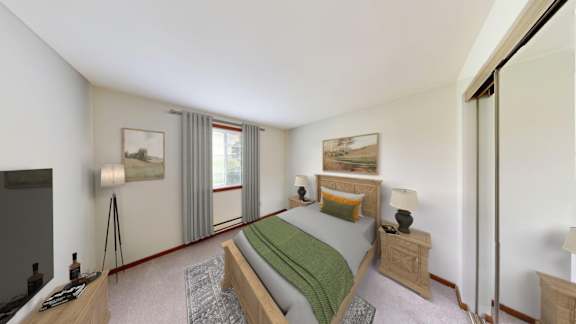 A bedroom with a bed, nightstand, and a television.