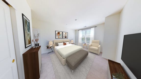 a bedroom with a bed and two chairs and a tv