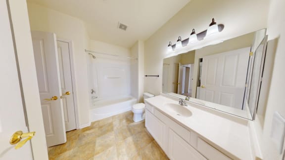a bathroom with a sink and a toilet