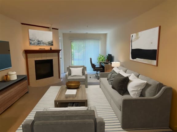 a living room with a couch and a fireplace