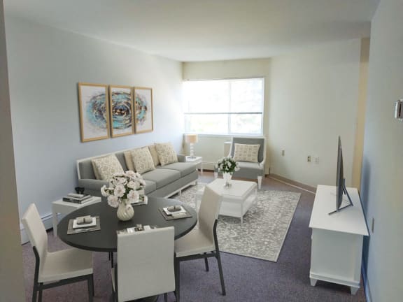 a living room with a couch and a table
