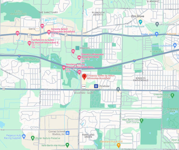 a map of a city with markers on it and a red arrow pinpointing locations