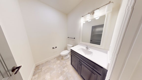 a bathroom with a sink and a toilet