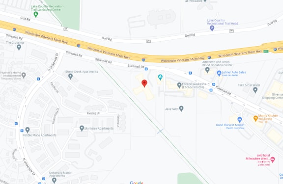 a screenshot of a map with a red dot on it