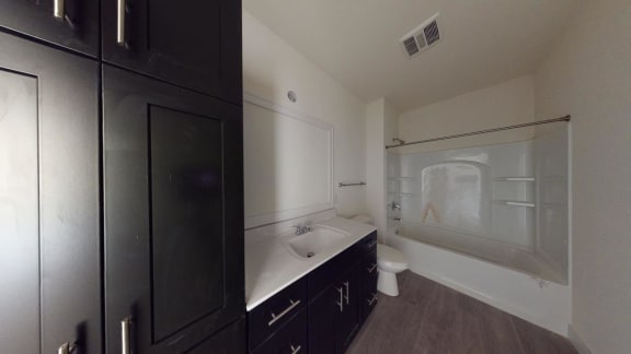 a bathroom with a sink and a toilet