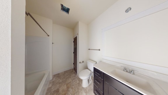 a bathroom with a sink and a toilet