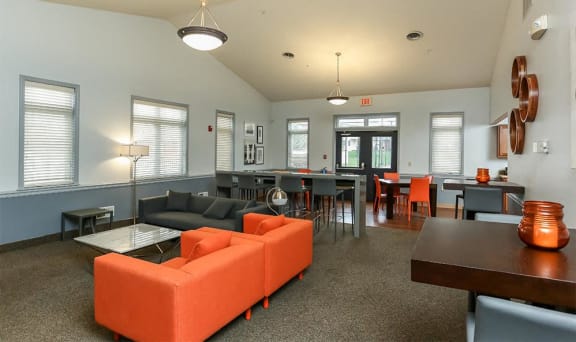 a living room with a couch and a table at Centerpointe Apartments, Canandaigua, 14424