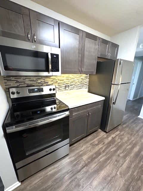 Stainless Steel Appliances Including Dishwasher And Built-In Microwave