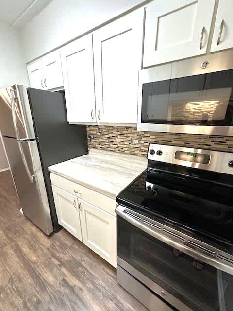 Stainless Steel Appliances Including Dishwasher And Built-In Microwave
