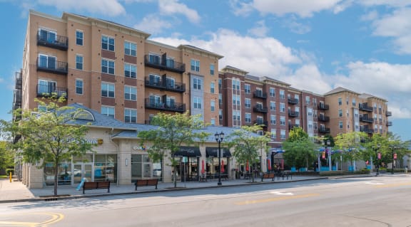a large apartment building on a city street  at Elmhurst 255, Illinois