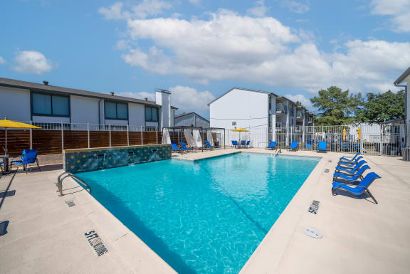 our apartments have a resort style pool with lounge chairs