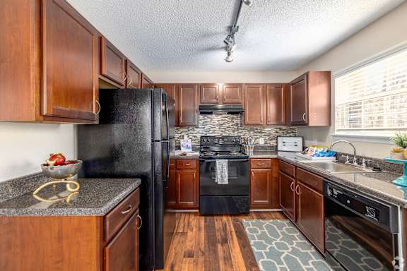 Kitchen with fridge at Radbourne Lake Apartments, North Carolina, 28269