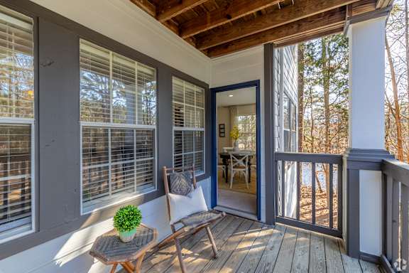 Balcony with table and chair at Radbourne Lake Apartments, Charlotte, 28269