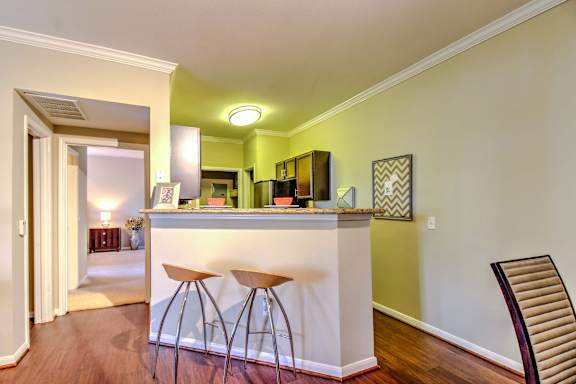 Kitchen with island at Stone Creek at Old Farm Apartments, Texas, 77063