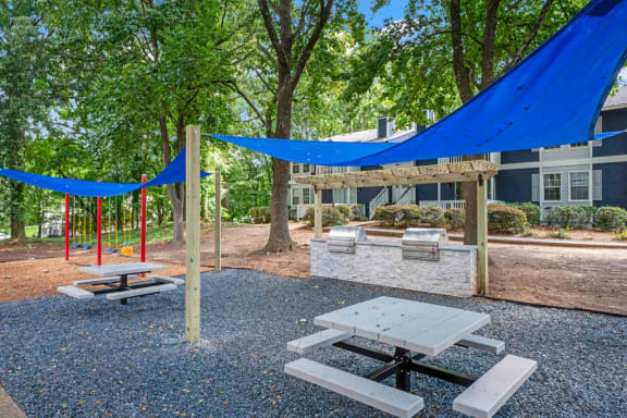 our apartments have a community picnic area with tables and chairs