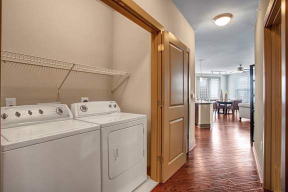 A laundry room with a washer and dryer.