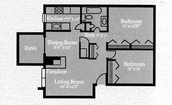 A floor plan of a house with a living room, dining room, kitchen, and two bedrooms.