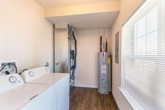 A laundry room with a washer and dryer.