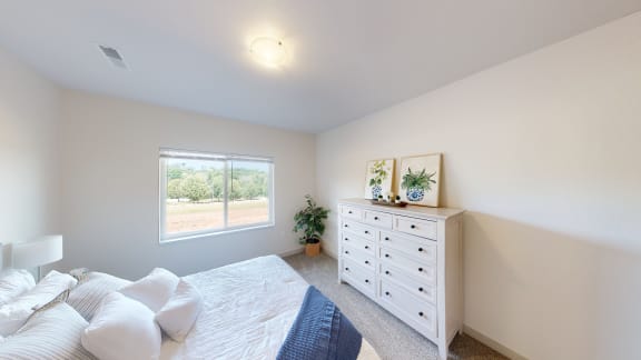 Primary bedroom, with queen bed and large dresser