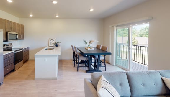 Kitchen and dining area, with balcony