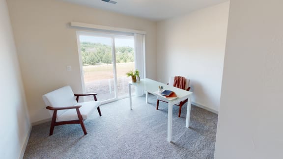 Secondary bedroom with walk out patio