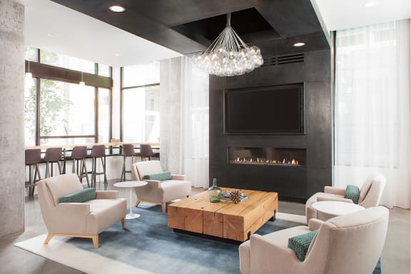 4730 California Apartments Clubhouse Seating with Fireplace and Television