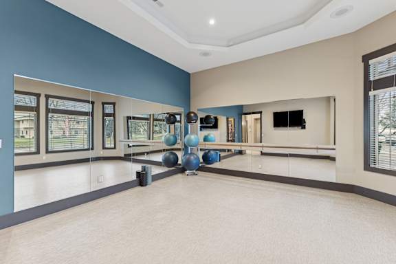 A room with a blue wall and a white floor.