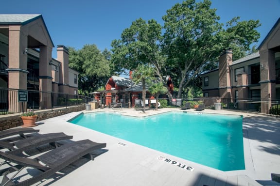 Poolside Relaxing Area at 5636 Apartment Homes, Dallas, TX, 75254