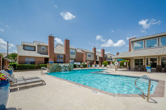 Pool with deck at Amberly Village Townhomes, Texas