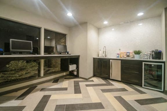 a room with a desk and a television in it at Rock 35, Round Rock, TX, 78681