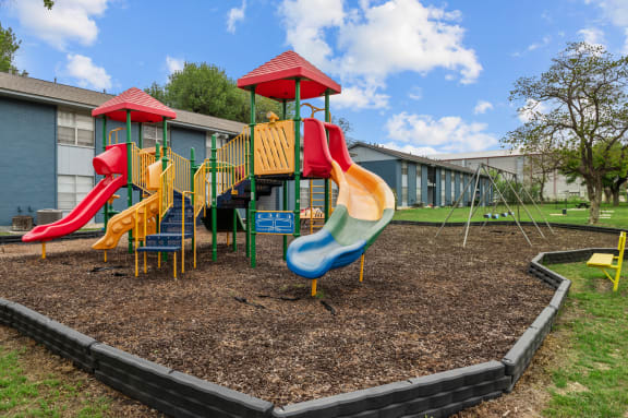 a playground at the whispering winds apartments in pearland, tx at Sunset Heights, Texas, 78209