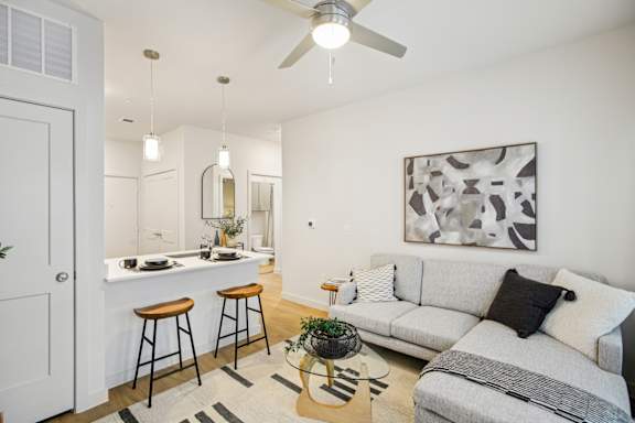 Open living space with sofa  at Matador Apartments, Austin, Texas