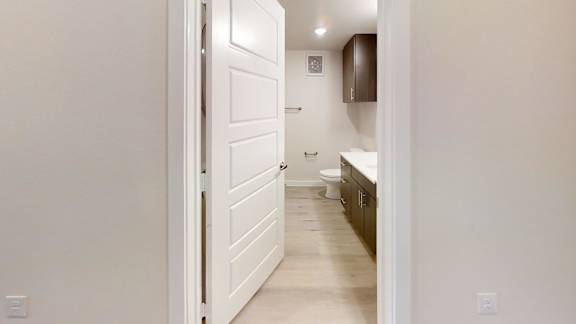 a bathroom with a bathtub and shower in a 555 waverly unit at Avery Ranch, Austin, 78717