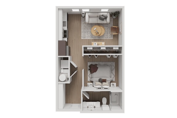 A small, neatly organized studio apartment with a bed, desk, and kitchenette.