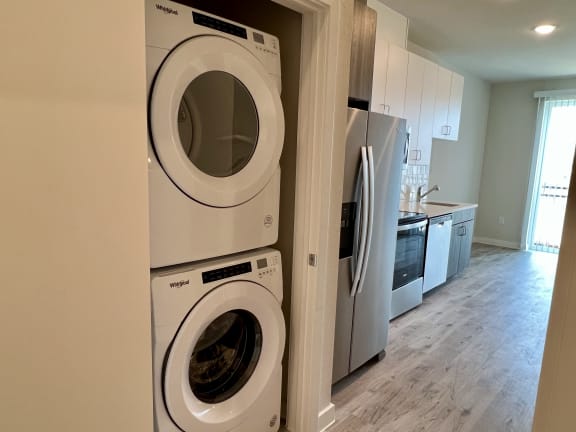 a laundry room with a washer and dryer