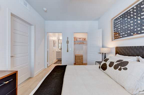 Bedroom with ensuite bathroom and walkin closet at Matador Apartments, Austin, Texas