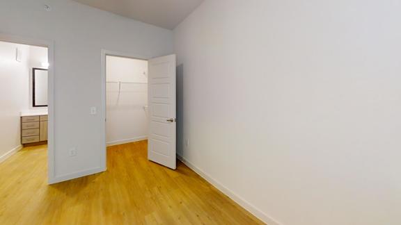 A room with a white door and a white cabinet. at Park South Apartments, Austin, TX, 78748