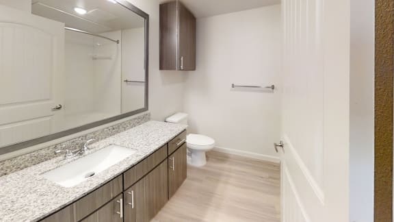 a bathroom with a sink toilet and mirror at Avery Ranch, Austin, 78717