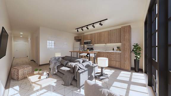 A modern living room with a grey sofa and a wooden cabinet.