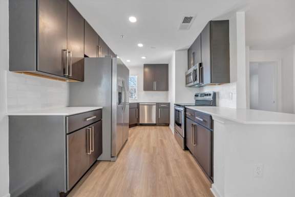 Kitchen at The Vinings Apartments in Richmond, VA 23234