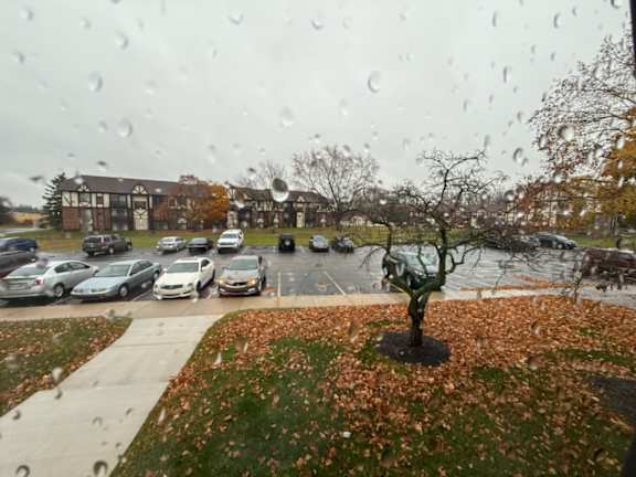 a view of a parking lot from a window