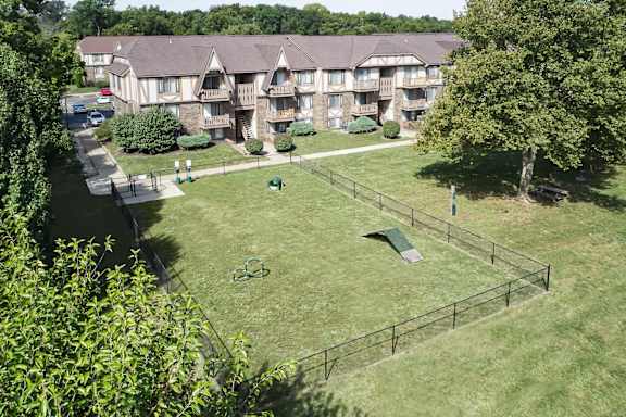 an aerial view of the backyard of an apartment complex at The Timbers Apartments, Evansville, Indiana
