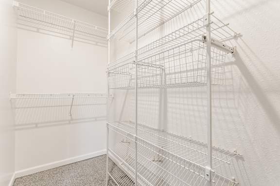 Empty white shelving unit in a room