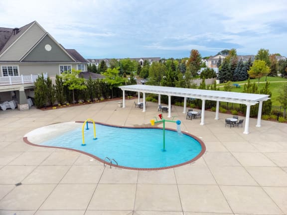 our apartments showcase a swimming poolat The Harbours Apartments, Michigan