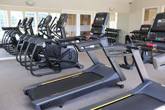 A row of treadmills and elliptical machines in a gymat LakePointe Apartments, Ohio, 45103