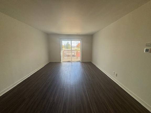 Living room featuring vinyl plank flooring.