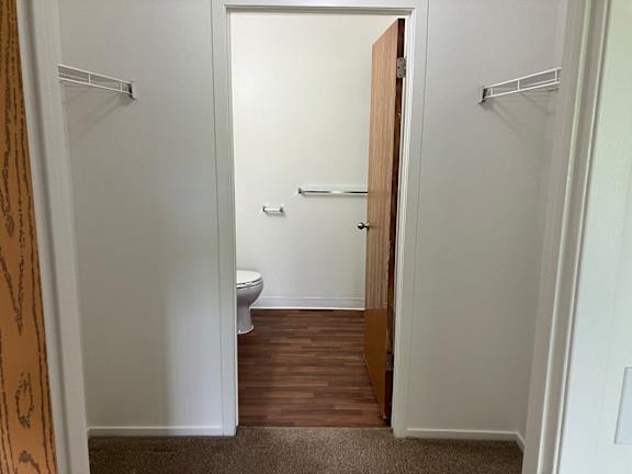 A walk-through closet off the main bedroom.