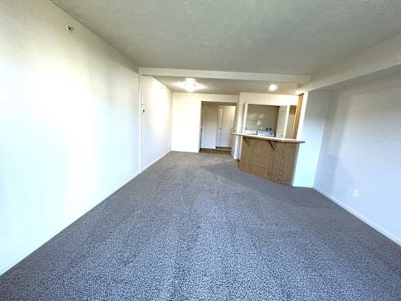 Open living and dining area at Heatherwood Apartments, Michigan