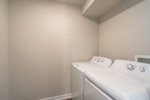 a washer and dryer in a laundry room at Hillside Apartments, Michigan, 48393