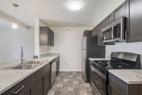 Kitchen with Stainless Steel Appliances Offered at Andover Pointe Apartment Homes, La Vista, 68138